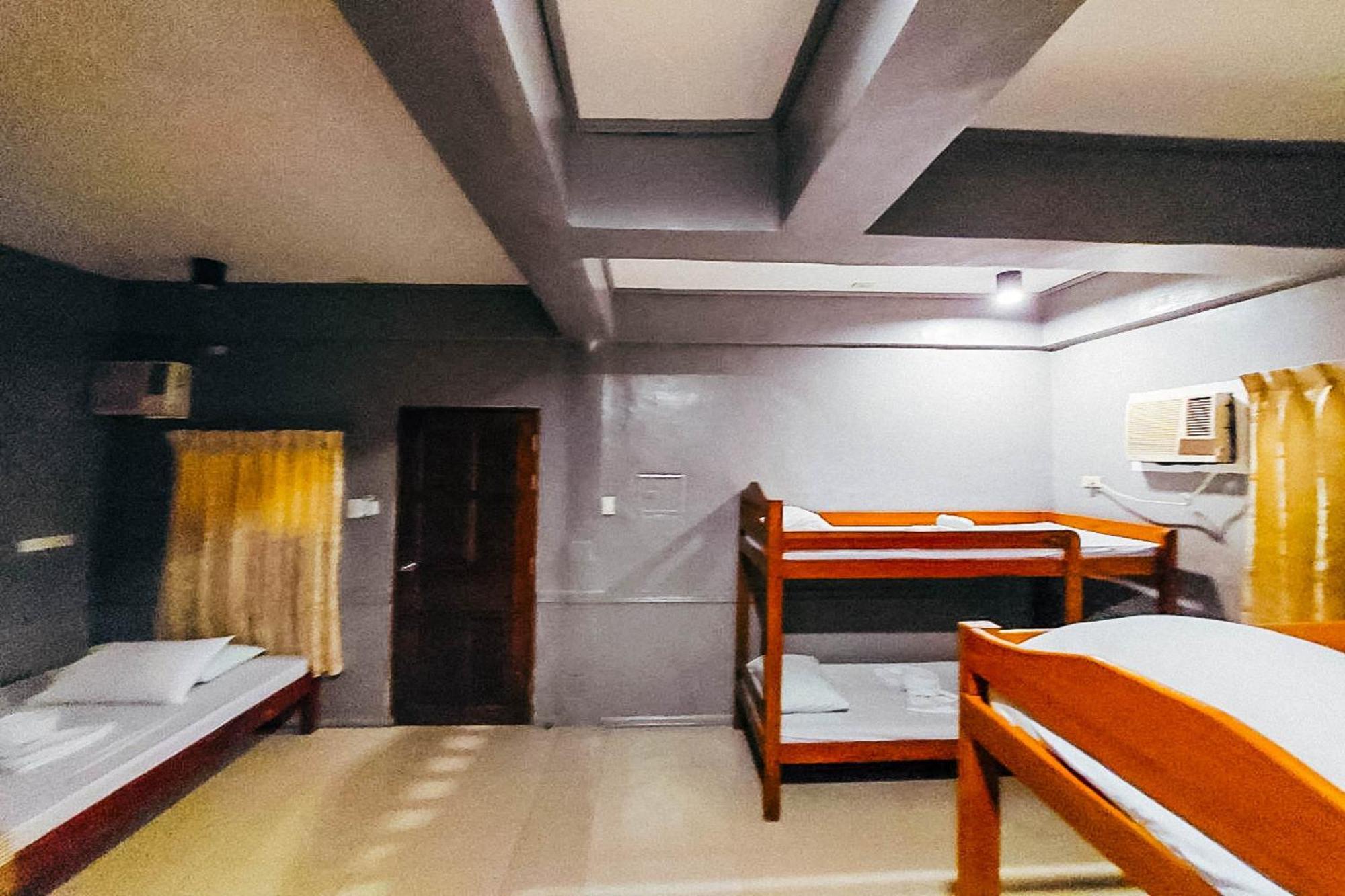 Mbg Travellers Inn Powered By Cocotel Puerto Princesa Camera foto