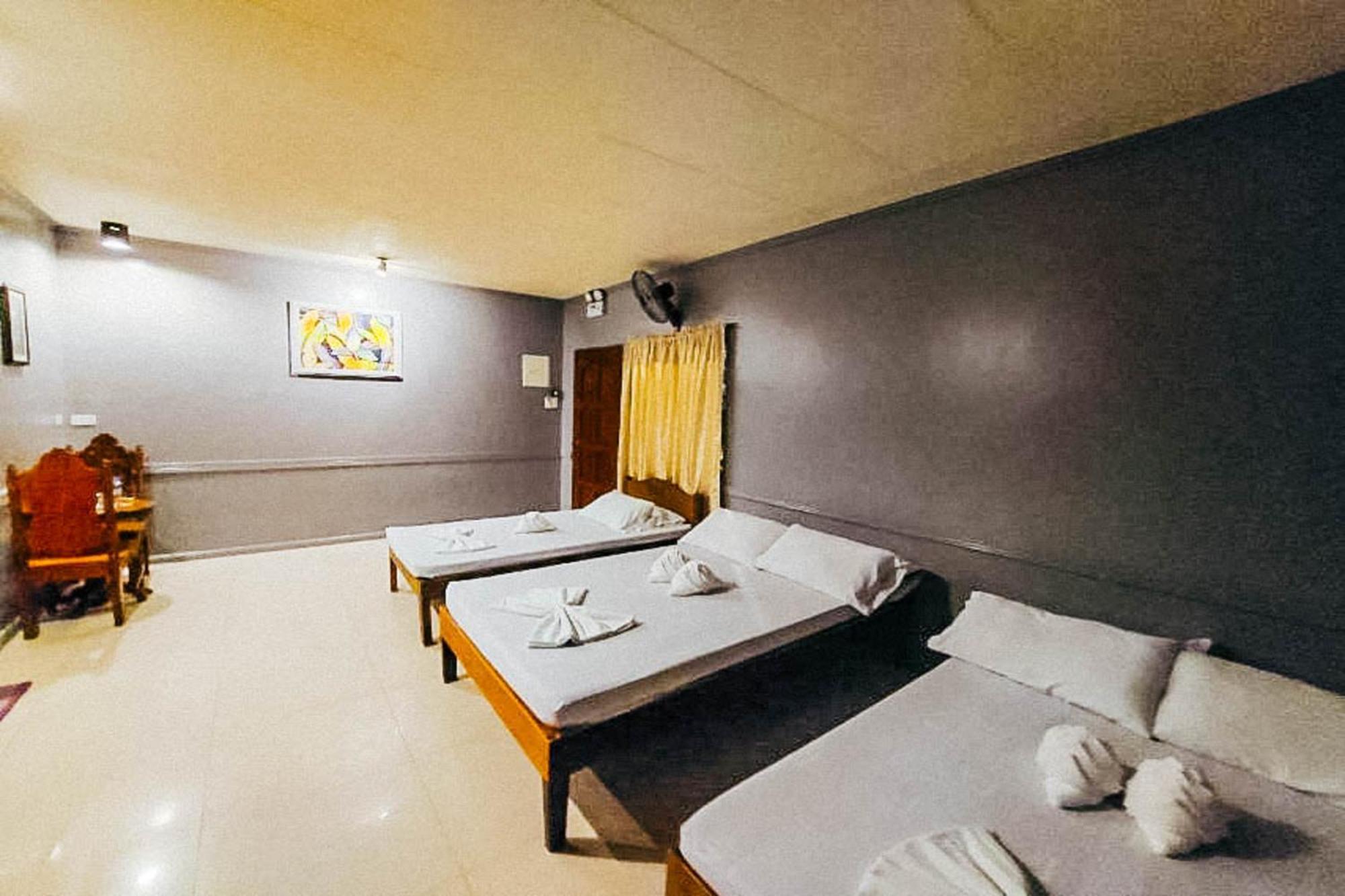 Mbg Travellers Inn Powered By Cocotel Puerto Princesa Camera foto