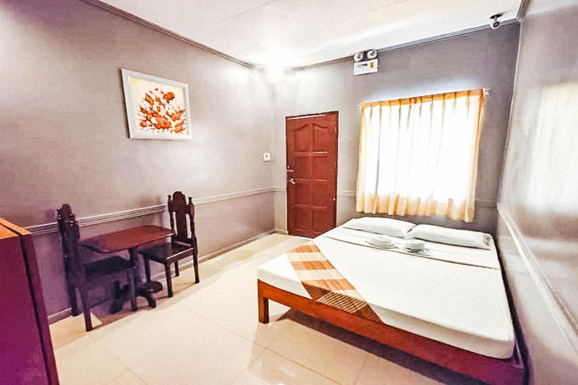 Mbg Travellers Inn Powered By Cocotel Puerto Princesa Camera foto
