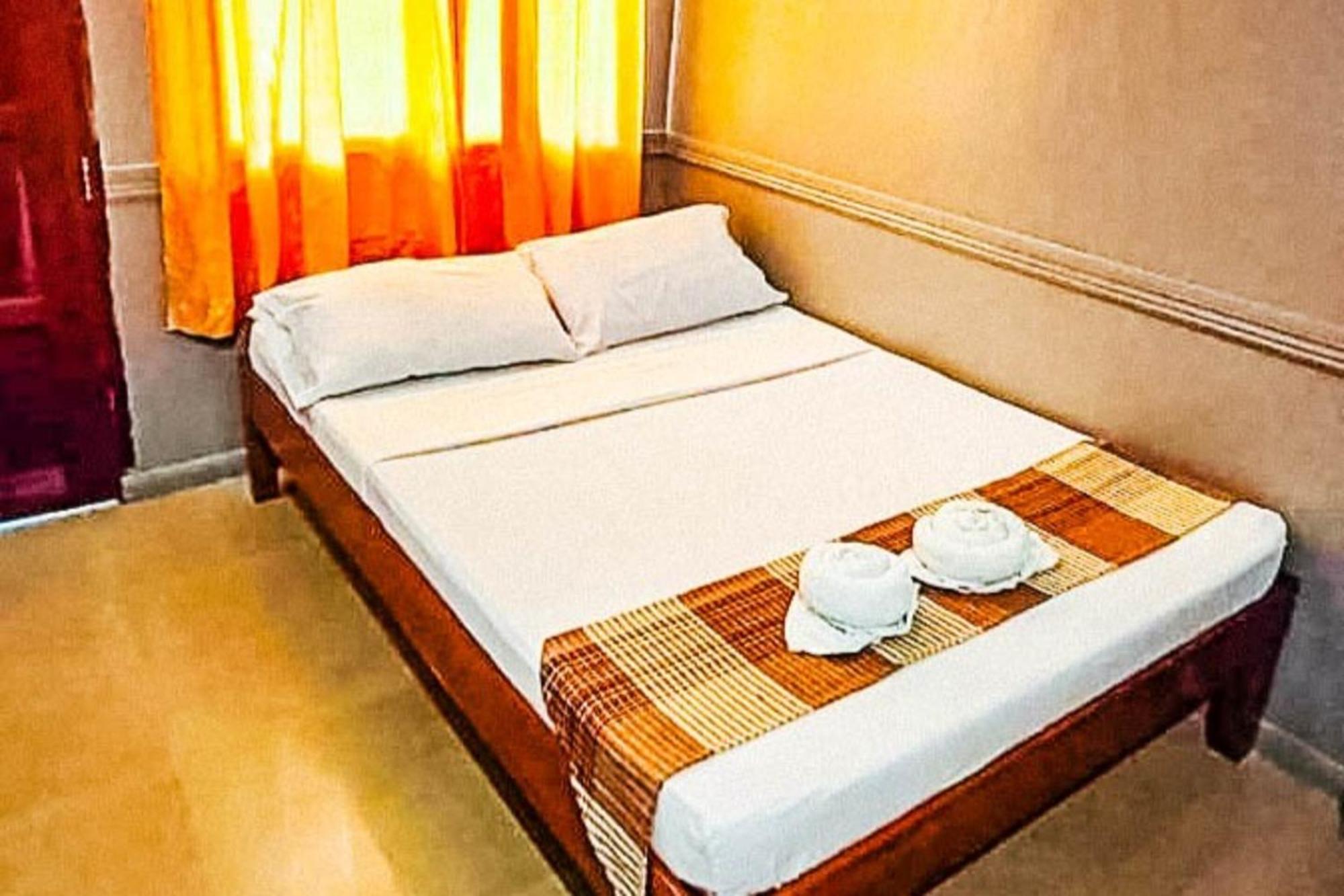 Mbg Travellers Inn Powered By Cocotel Puerto Princesa Camera foto