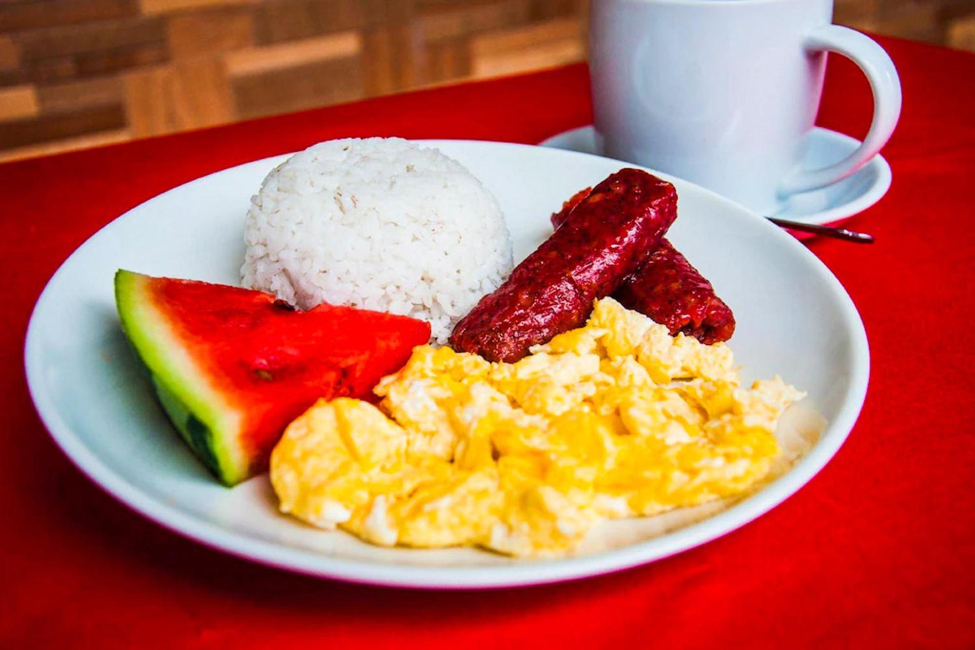 Mbg Travellers Inn Powered By Cocotel Puerto Princesa Esterno foto