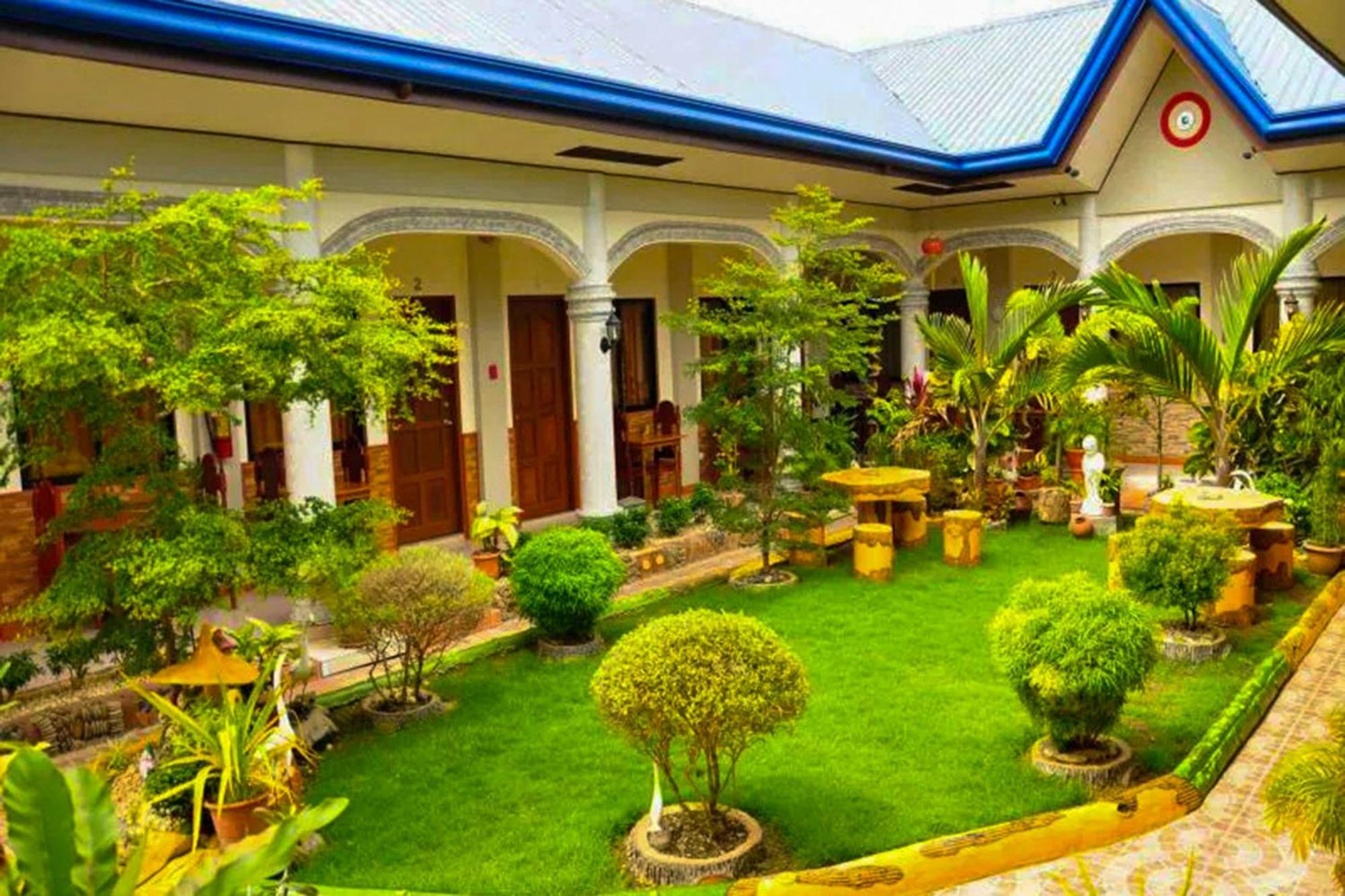 Mbg Travellers Inn Powered By Cocotel Puerto Princesa Esterno foto